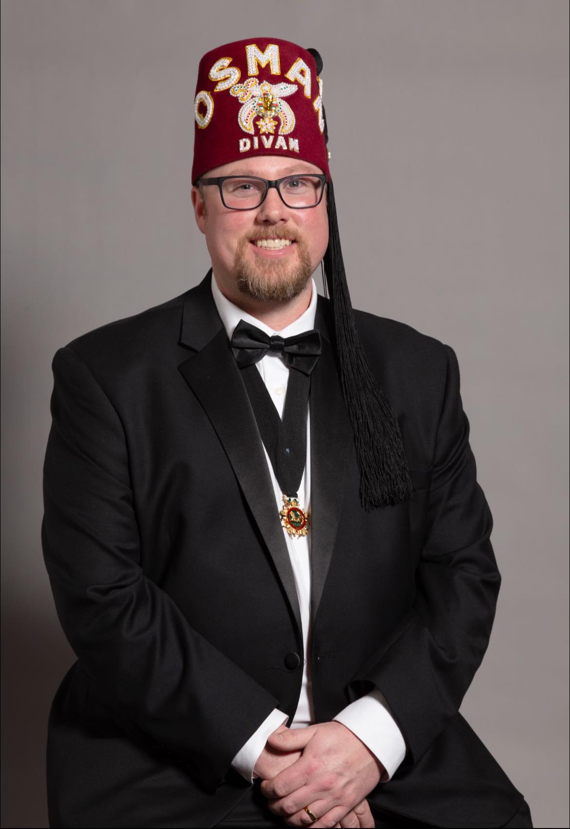Doug Weisbrod portrait against a grey background